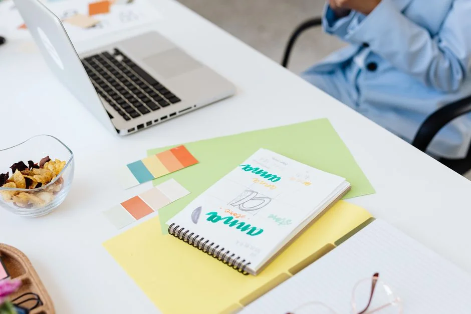 A close up of the Google Material design sticker sheet on a MacBook.
